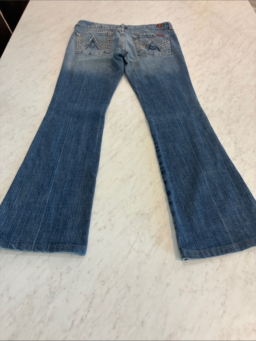 7 For All Mankind Women's Blue Flare Jeans with Embellished Back Pockets